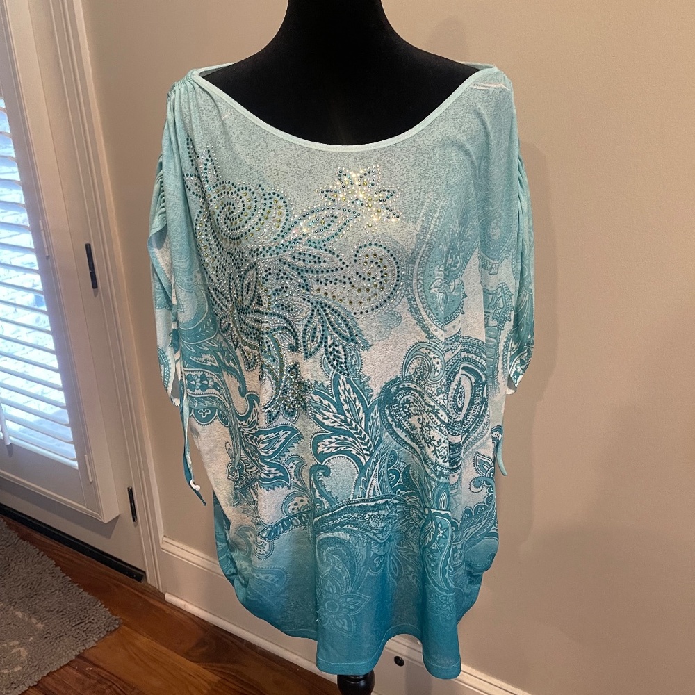 Absolutely beautiful Reba plus size print blouse with bling.